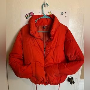 Women’s orange puffer jacket